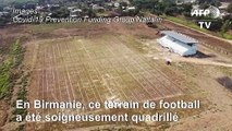 Coronavirus: en Birmanie, un terrain de foot transformé en marché pour respecter la distanciation