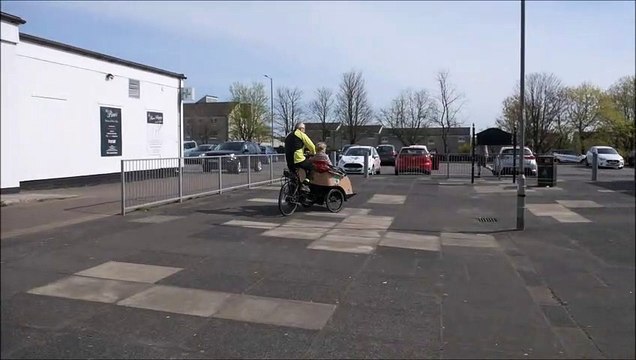 Retired GP Ken McLean and Cycling Without Age delivering prescriptions for Pines Pharmacy in Denny