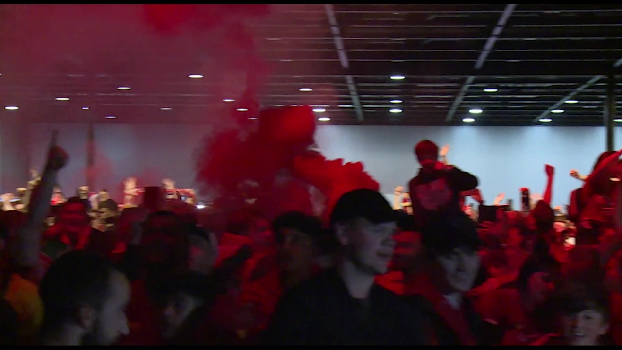 Liverpool fans celebrate at final whistle