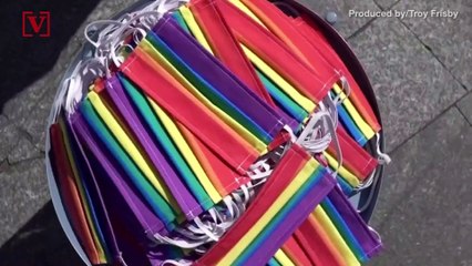 Gay Couple Fighting Homophobia in Poland by Handing Out Free Rainbow Face Masks