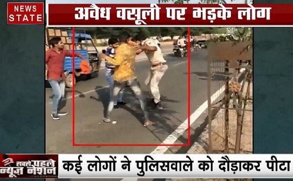 Viral Video: राजस्थान के जोधपुर में अवैध वसूली करते पुलिसकर्मी को लोगों दौड़ाकर पीटा, देखिए ये Video