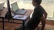 Guy Exercises During Meeting While Working From Home During the Coronavirus Pandemic