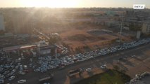 Drone footage captures massive queues at Khartoum petrol station amid COVID-19 lockdown