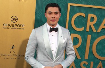 Henry Golding's dog bites another pooch