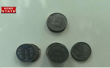दुकानदार द्वारा एक रूपये का सिक्का न लेने से ग्राहक परेशान