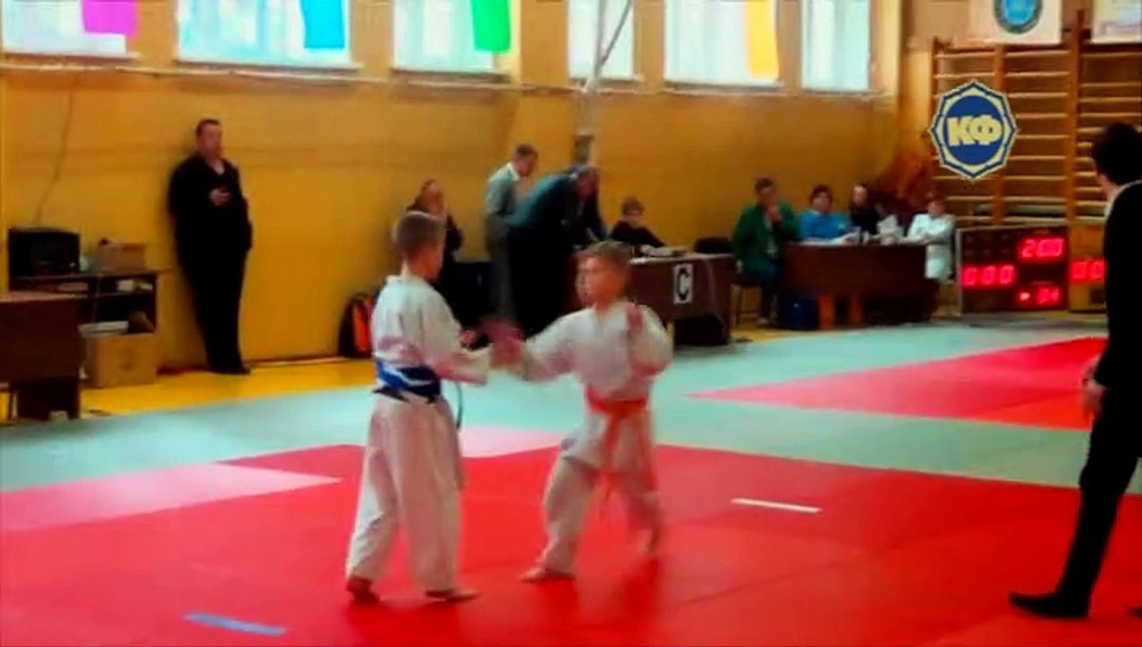 Children Judo lessons. Technique of retaking a hold.