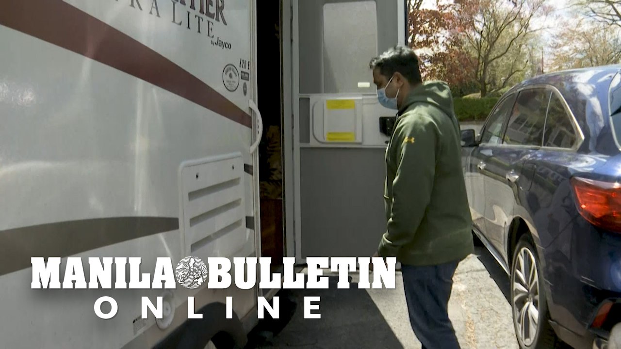 To protect his family, US doctor moves into an RV