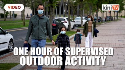 Spanish children get outside for first time in six weeks