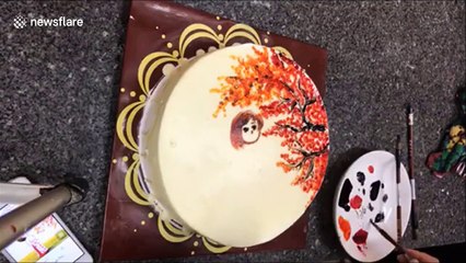 Vietnamese baker paints incredibly detailed picture on top of cake