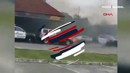 Binanın yanmasını polis aracıyla engelledi