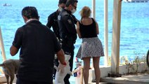 Yasağa rağmen sahilde bikinisiyle güneşlenen kadın hakkında tutanak tutuldu