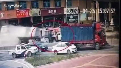 Huge stone block crushes car after falling off trailer in southern China