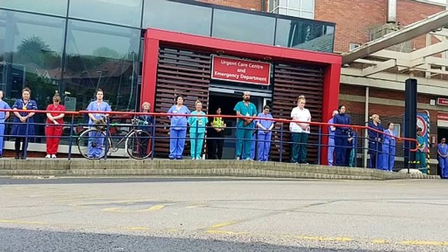 NHS staff at Blackpool Victoria Hospital honour healthcare workers across Britain who have died from coronavirus