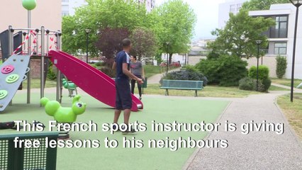 Instructor leads balcony gym classes under French lockdown