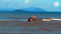 Barco fica preso à banco de areia e naufraga próximo a Marataízes