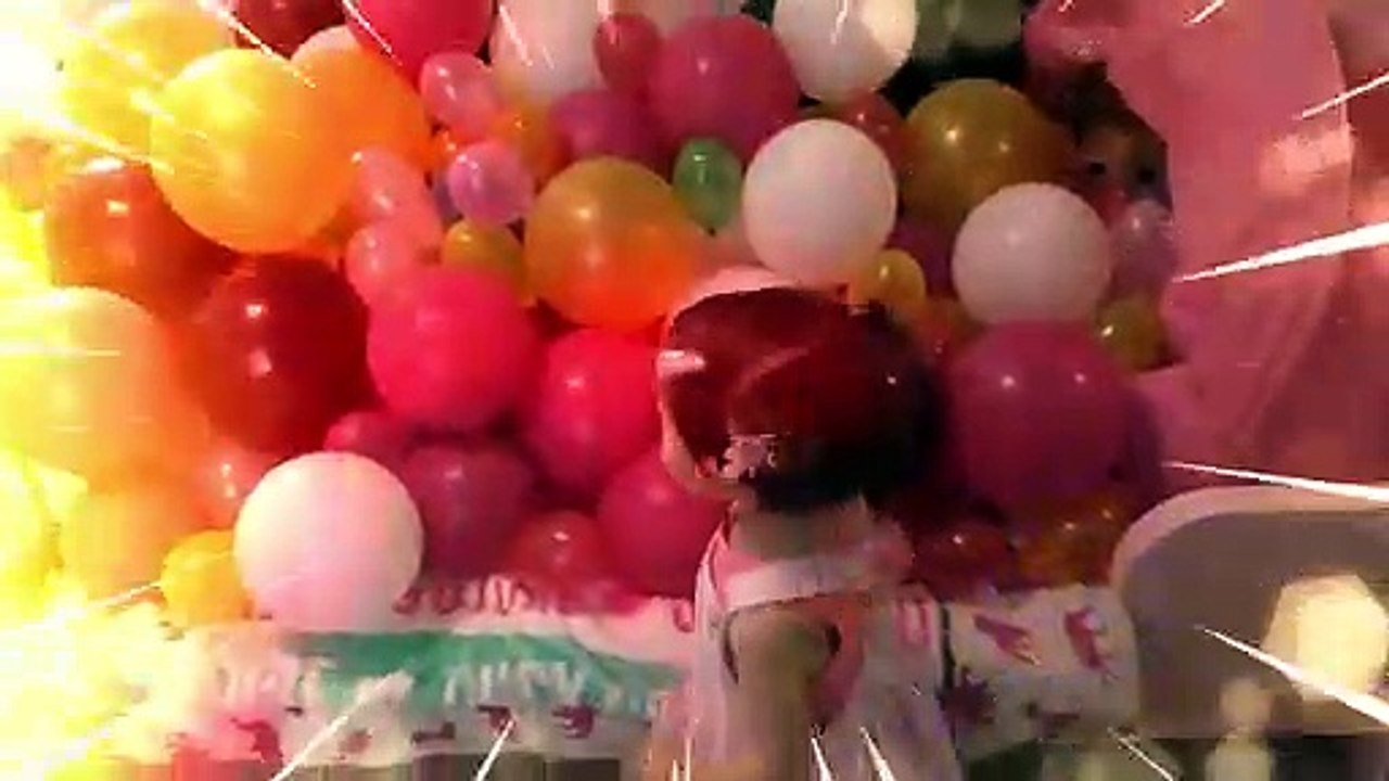 Kimiko is bored and wants a new toy! She gets a Super Wubble and a ton of colored balloons!