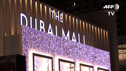 With fever checks and masks, Dubai's mega-mall reopens