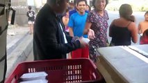 Kind Filipino family hand out free meals to locals who are badly affected by coronavirus lockdown