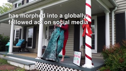 A Virginian plays dress up on her front porch to provide a little cheer