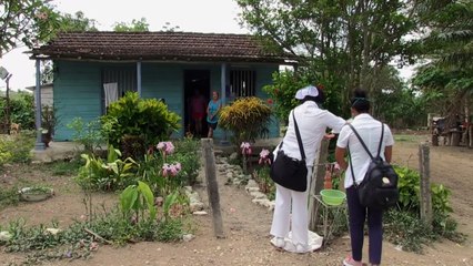 Cuban medics go door to door to track virus