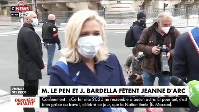 Insolite: Marine Le Pen et Jordan Bardella masqués déposent une gerbe de fleurs au pied de la statue Jeanne d'Arc