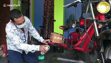 Indian father creates 'social distancing bike' so he can cycle with daughter