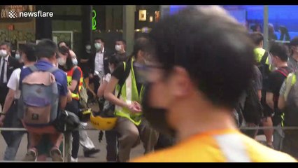 Anti-government protesters chant 'glory to Hong Kong' despite heavy police presence