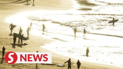 Australia earns an 'early mark' and now reviews easing measures