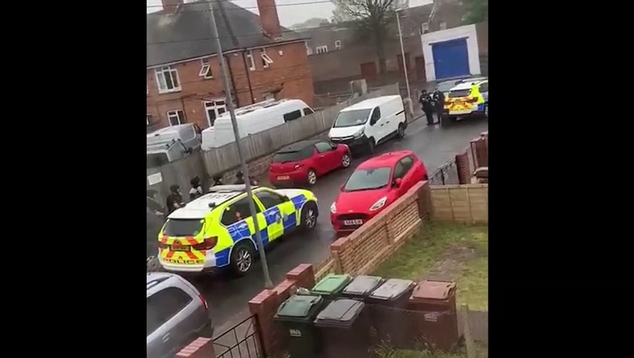 Neighbours film armed police raid at a Norway Road property in Eastbourne