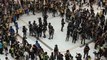 Hong Kong riot police use pepper spray at a shopping mall in Sha Tin