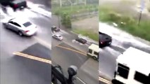 Une McLaren 600LT Spider tente de traverser une rue inondée