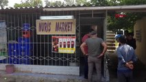 Antalya'da kısıtlamaya rağmen duvar delip marketi soydular