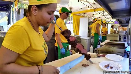 Brazil Street Food. Roasting Huge Churrasco and Meat on Grill