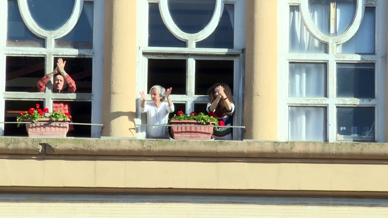 Romans cheer from their windows ahead of partial lockdown easing