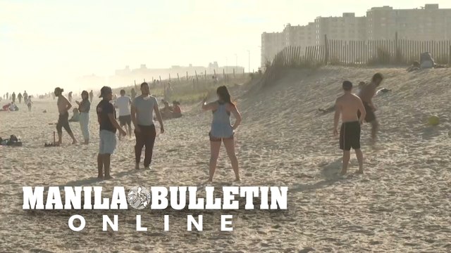 New Yorkers head to Rockaway Beach as coronavirus cases decline