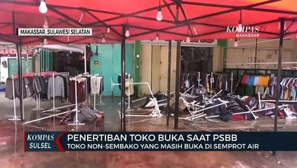 Sejumlah Toko Non Sembako Yang Masih Buka Disemprot Air