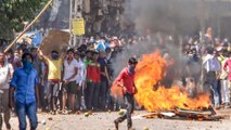 Clashes break out between police and migrant workers