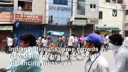 Chaos outside liquor stores as India eases virus lockdown