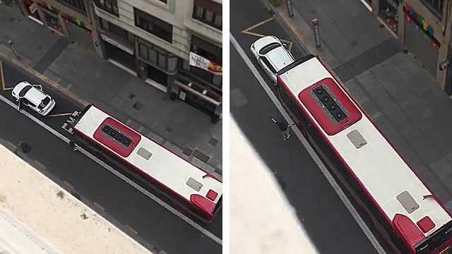 Un chauffeur de bus dégage un automobiliste garé sur une voie de bus