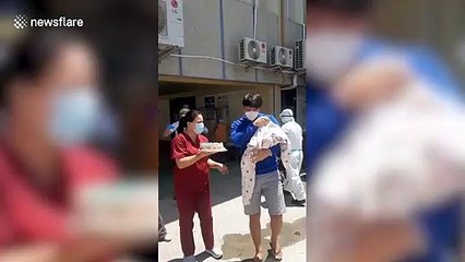 Heartwarming moment 2-month-old baby leaves hospital after surviving COVID-19 in the Philippines