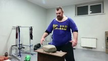 Russian Man Demonstrates Big Stone Hand Training