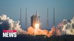 China launches spacecraft via largest carrier rocket