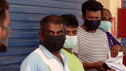 Singapore's migrant workers form most of its 20,000 virus cases