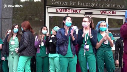 Heartwarming scenes as crowd clap for essential workers outside NYU Langone Hospital in Manhattan