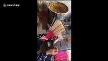 Witness this Vietnamese woman make incense sticks at lightning speed