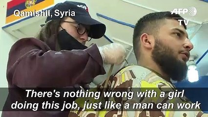 Young woman trains to be first female barber in northeastern Syria