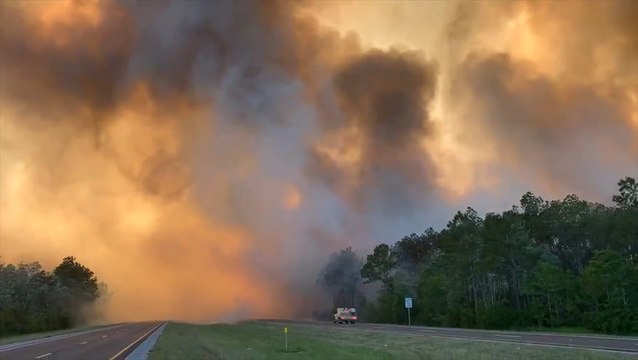 Firefighters work to contain Five Mile Swamp Fire
