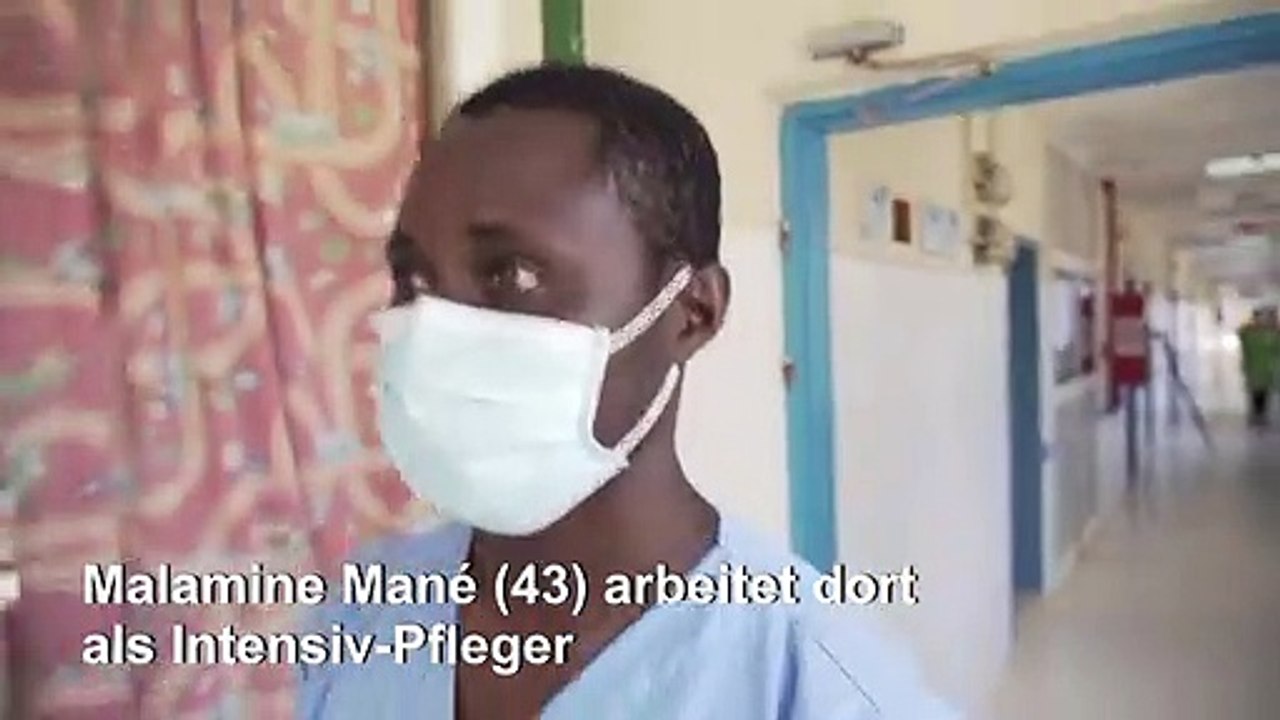Corona-helden: krankenpfleger malamine mané aus dem senegal