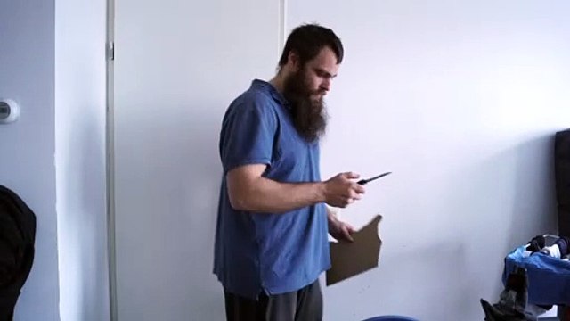 A black, Tac-Force stainless steel folding knife test