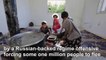 Displaced Syrian family returns to destroyed frontline Idlib town over virus fears